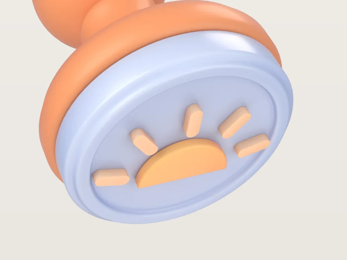 A soft 3D rubber stamp tilted toward the viewer, its face carrying a sun emblem